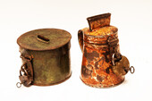 2 painted iron nineteenth century Dutch piggy banks, each with a well functioning brass padlock with key.