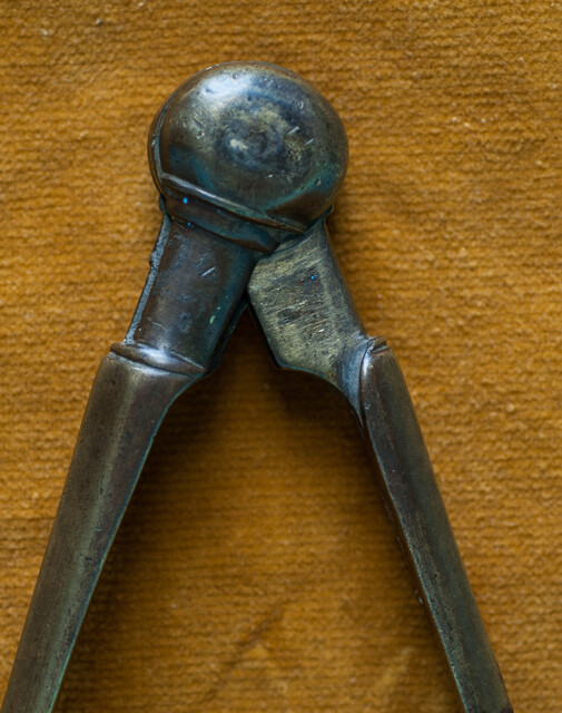 A 17th C Dutch brass and steel pair of navigational dividers.