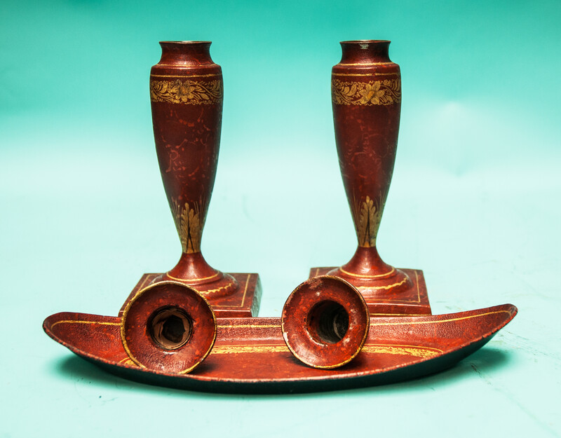 A 19th C. set of pewter candlesticks and a small oval tray, lacquered in red and gold.