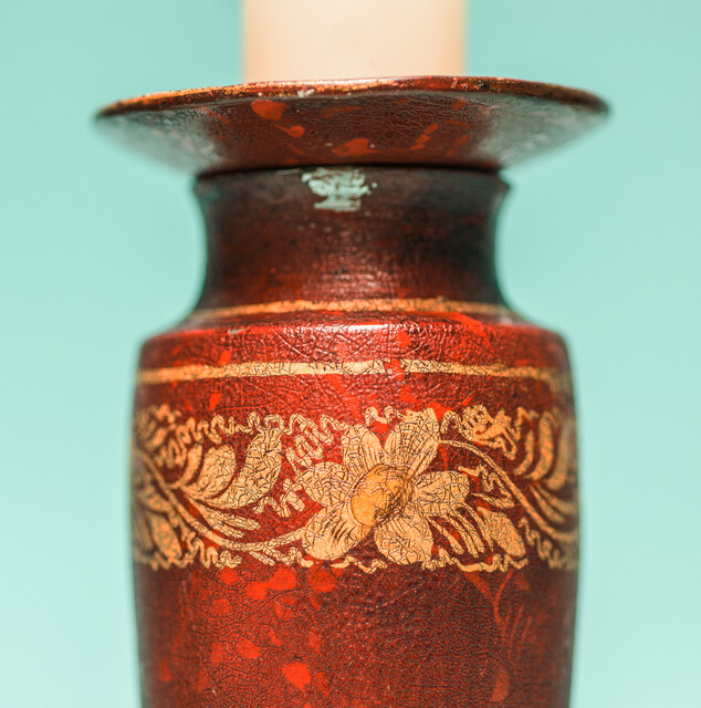 A 19th C. set of pewter candlesticks and a small oval tray, lacquered in red and gold.