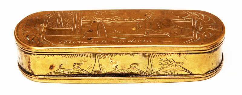 A brass 17th C. Dutch tobacco box with a naughty text.