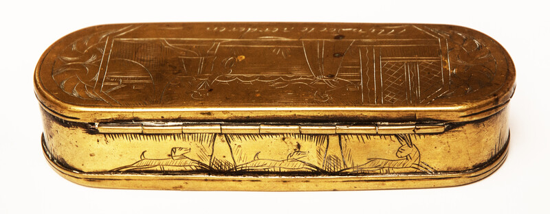 A brass 17th C. Dutch tobacco box with a naughty text.