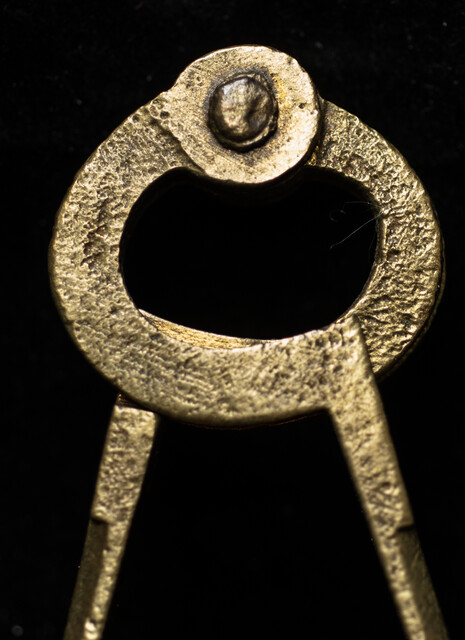 A brass seventeenth century one hand navigational compass.