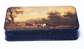 A Dutch early 19th C toolware tobaccobox handpainted with a rural scene.