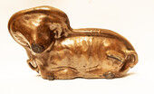 A Dutch nineteenth century earthenware double baking form for an easter lamb.