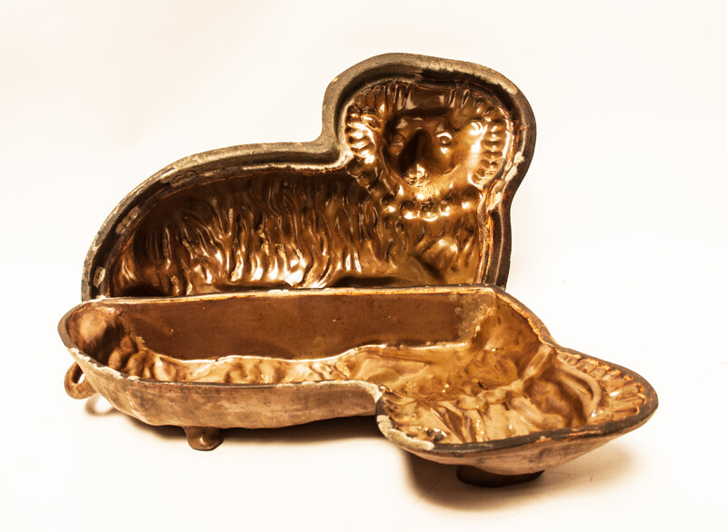 A Dutch nineteenth century earthenware double baking form for an easter lamb.
