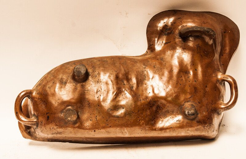 A Dutch nineteenth century earthenware double baking form for an easter lamb.