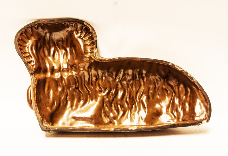 A Dutch nineteenth century earthenware double baking form for an easter lamb.