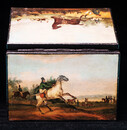 A large toolware tobacco box delicatery painted on both sides with scenes of a fox hunt.