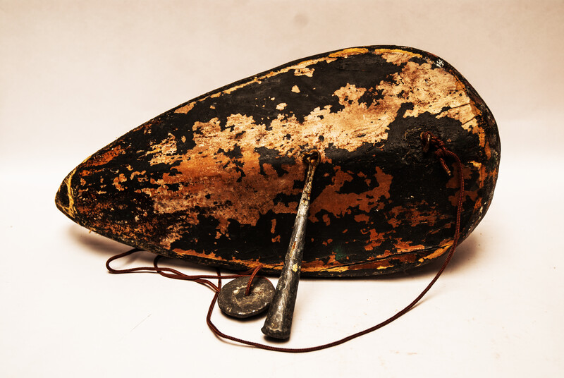 A nineteenth century Dutch wooden decoy duck with lead weights.