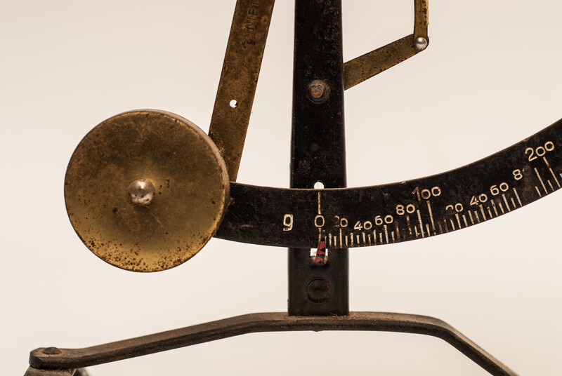 A nineteenth century precision balance of weights between 0 and 500 gram. 