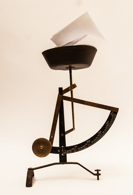 A nineteenth century precision balance of weights between 0 and 500 gram. 