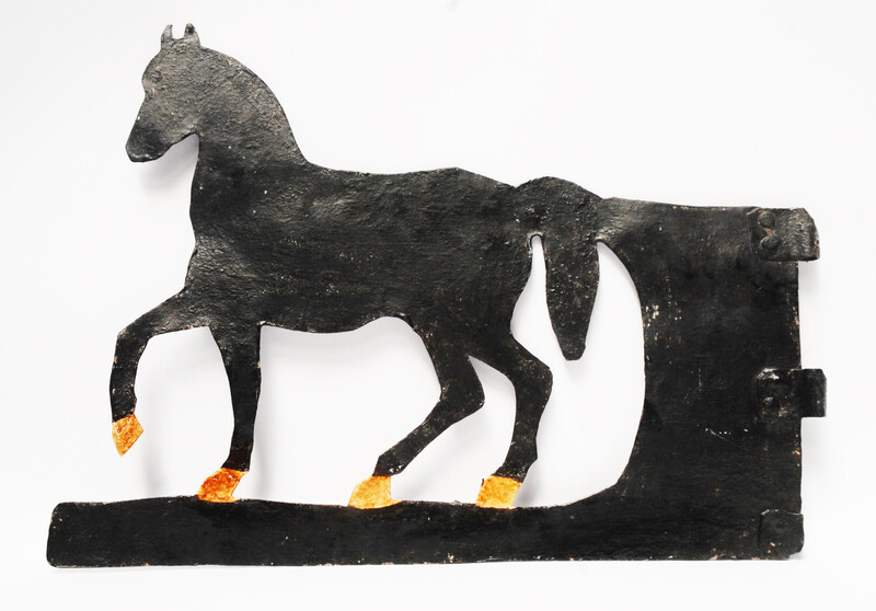 A painted eighteenth century Dutch iron weathervane in the form of a horse.