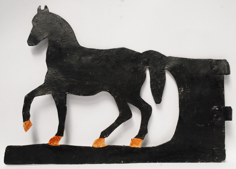 A painted eighteenth century Dutch iron weathervane in the form of a horse.