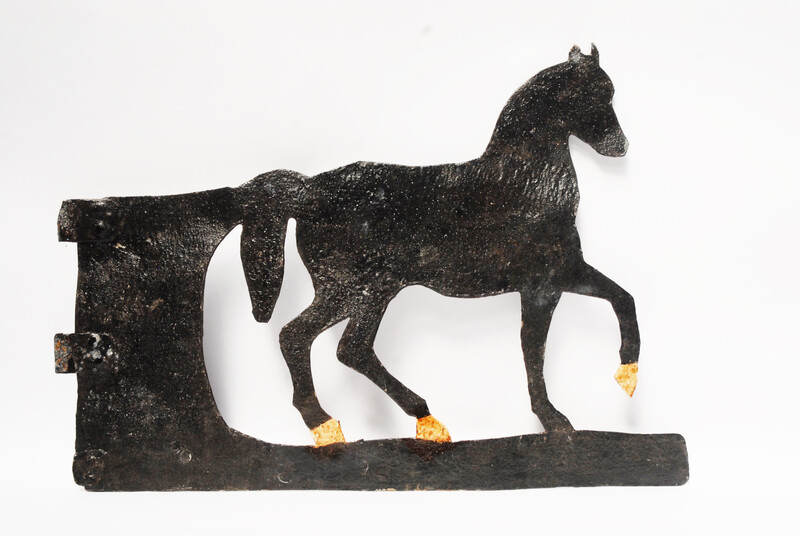 A painted eighteenth century Dutch iron weathervane in the form of a horse.