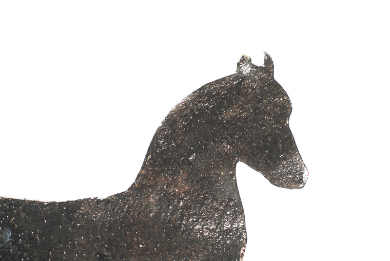 A painted eighteenth century Dutch iron weathervane in the form of a horse.