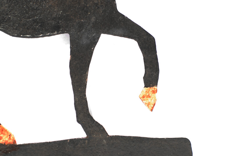 A painted eighteenth century Dutch iron weathervane in the form of a horse.