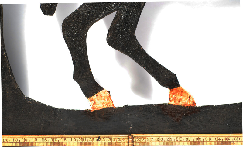 A painted eighteenth century Dutch iron weathervane in the form of a horse.