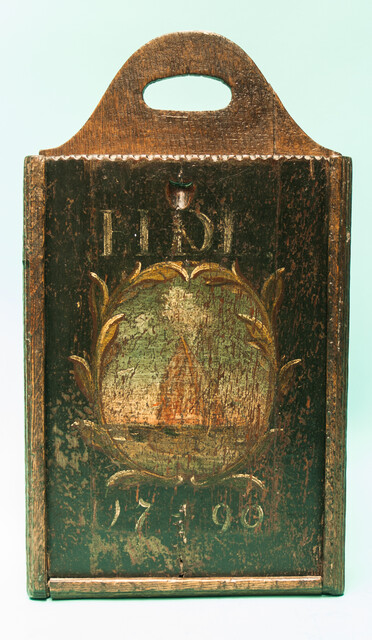 A painted oak schoolbox dated 1790.