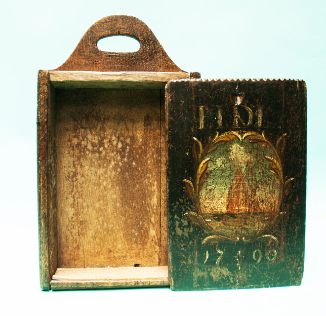 A painted oak schoolbox dated 1790.