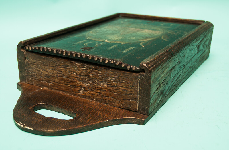 A painted oak schoolbox dated 1790.