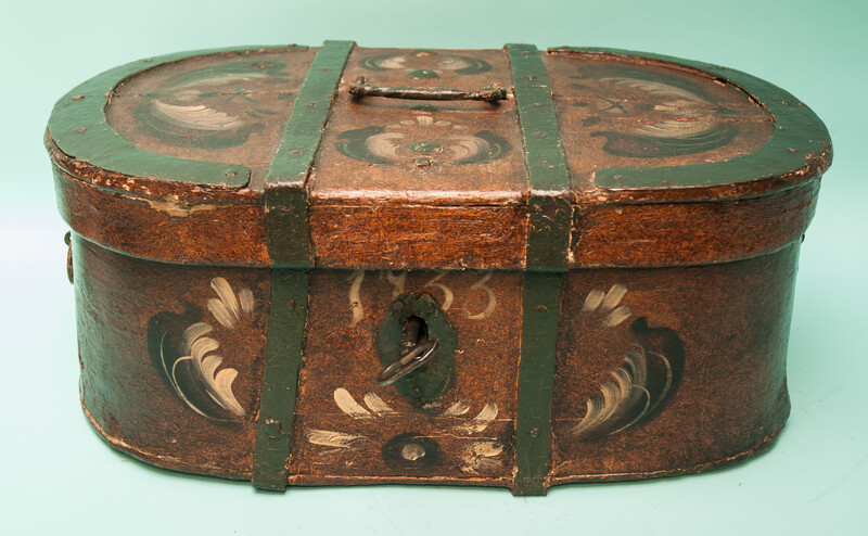 A painted ships-chest. Re-inforced with wrought iron. And dated 