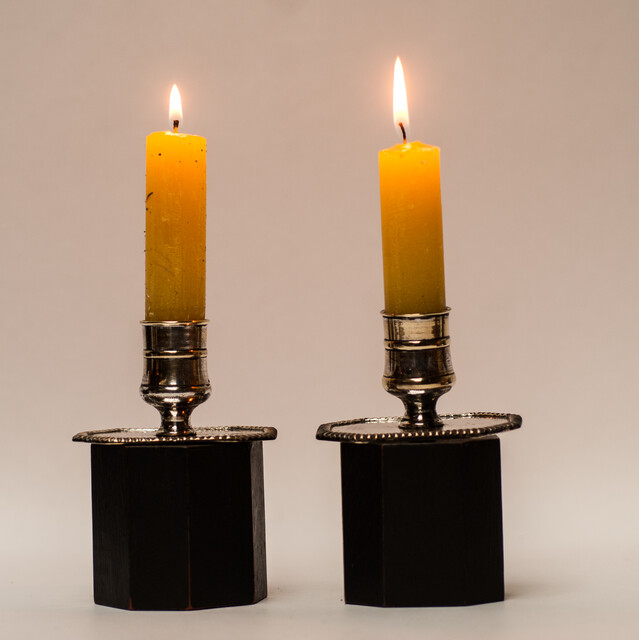 A pair of silver plated 18th Century Dutch church bench candlesticks.