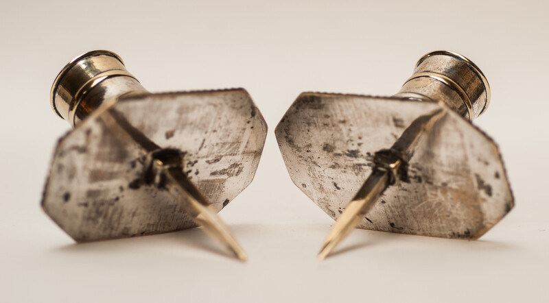 A pair of silver plated 18th Century Dutch church bench candlesticks.