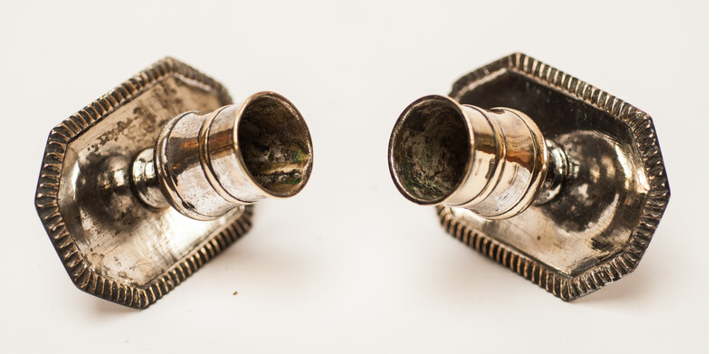 A pair of silver plated 18th Century Dutch church bench candlesticks.