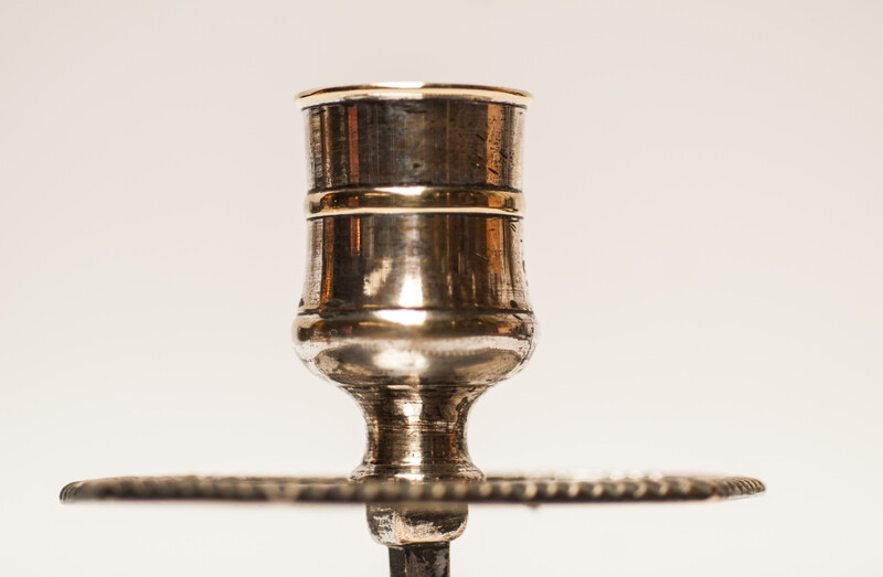 A pair of silver plated 18th Century Dutch church bench candlesticks.