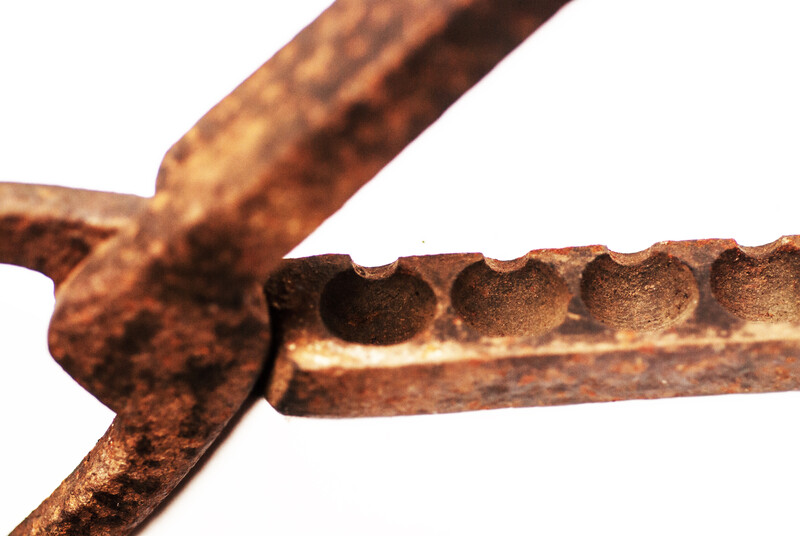 A rare 17th century iron plier for making lead bullets.