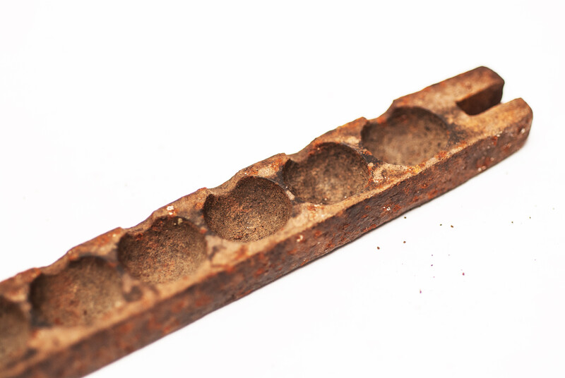A rare 17th century iron plier for making lead bullets.