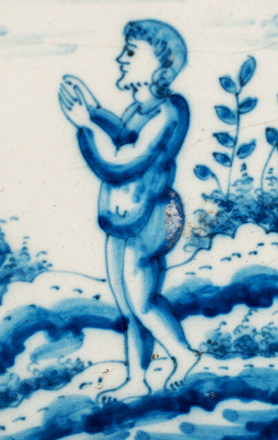 A rare biblical Delft blue tile with Adam listening to His Masters Voice in paradise. From  Genesis 2:7.