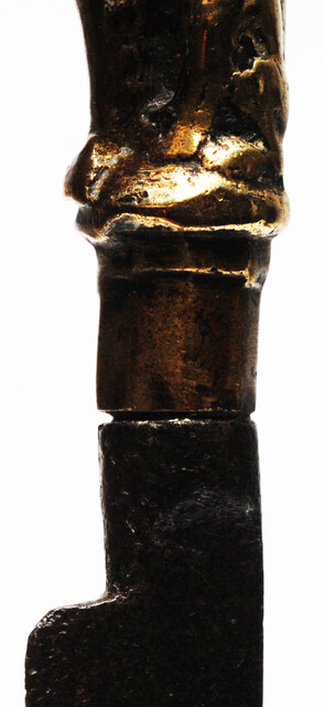 A seventeenth century Dutch knife with a brass handle showing a hunter and his dog.