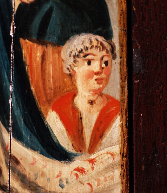 A small 18th C. hanging corner cupboard painted in Ameland with the story of Tomyris and the head of Cyrus.