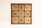 A unique Dutch painted draughtboard dated 1754, with a complete set of draughts in a fitted box.
