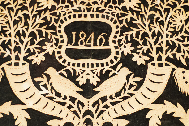 A very rare Dutch paper cutting with exquisite scenes of rural life and dated 1846.