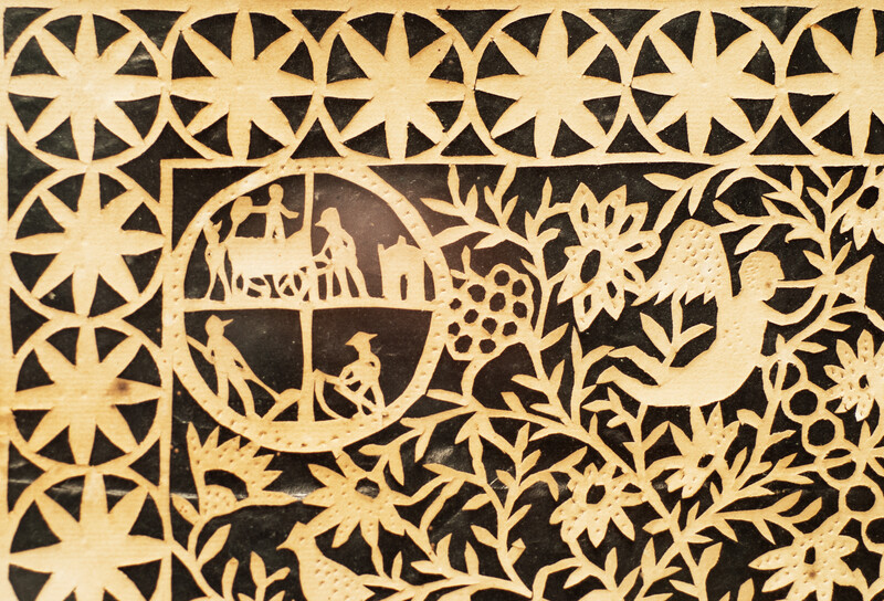 A very rare Dutch paper cutting with exquisite scenes of rural life and dated 1846.