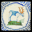 A very rare polychrome early seventeenth century Delft tile with a hart.