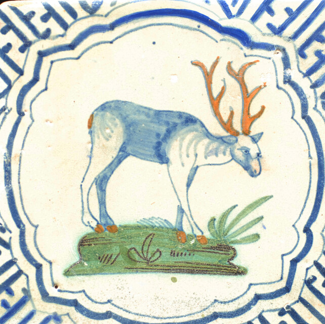 A very rare polychrome early seventeenth century Delft tile with a hart.