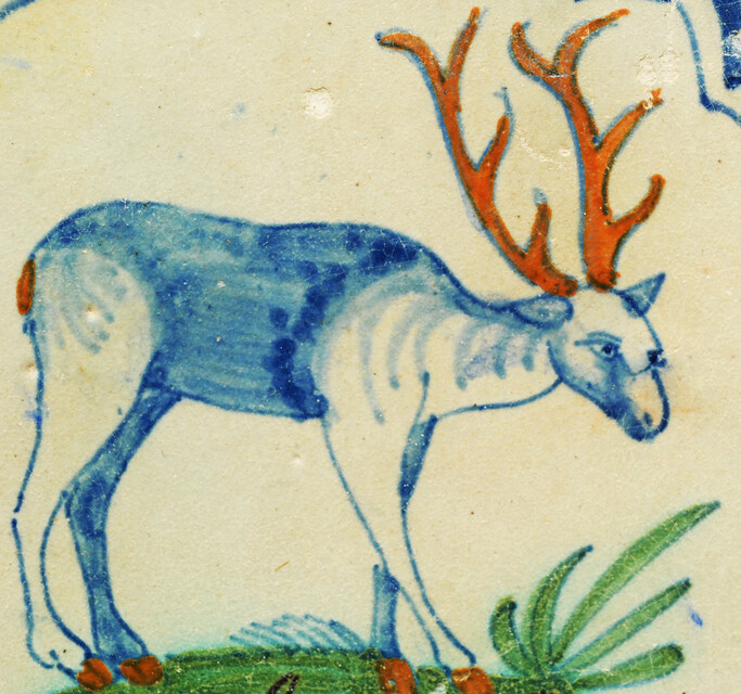 A very rare polychrome early seventeenth century Delft tile with a hart.