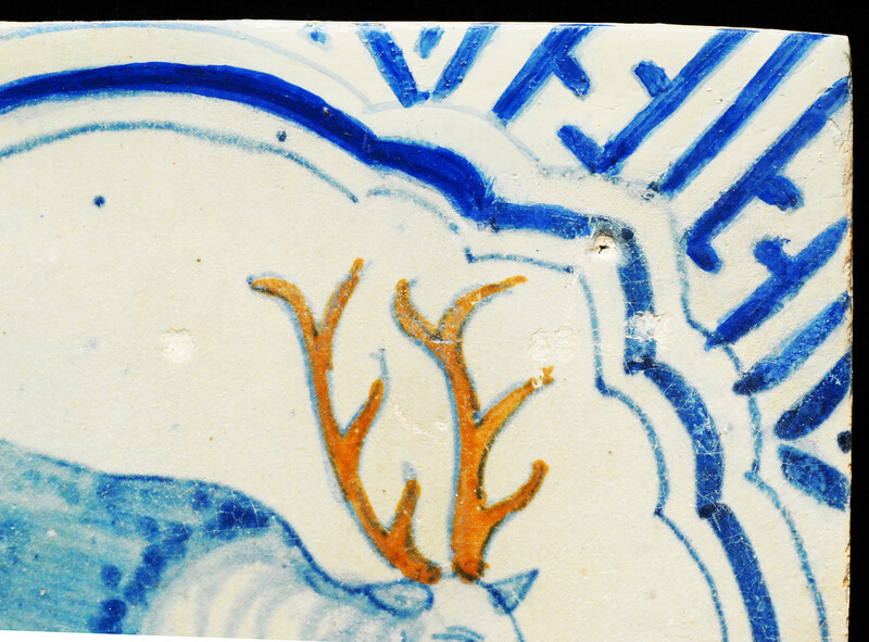 A very rare polychrome early seventeenth century Delft tile with a hart.