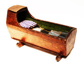 A well made nineteenth century dolls cradle.
