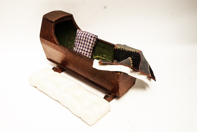 A well made nineteenth century dolls cradle.