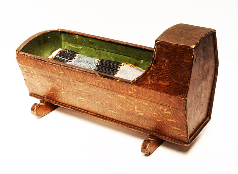 A well made nineteenth century dolls cradle.