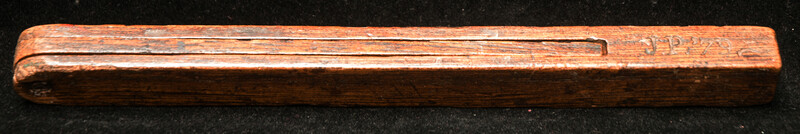 A wooden Dutch carpenters bevel dated 