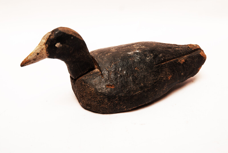 A wooden painted Dutch decoy bird in the form of a coot.
