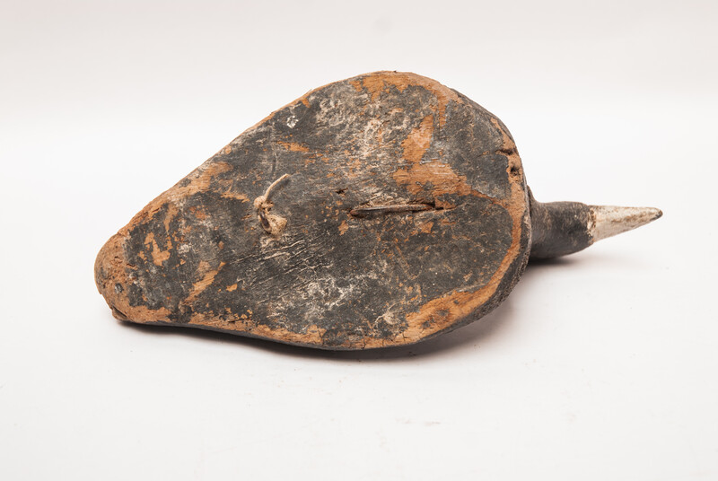 A wooden painted Dutch decoy bird in the form of a coot.