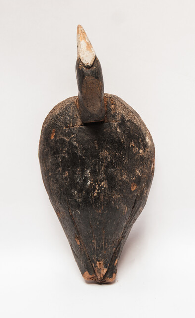 A wooden painted Dutch decoy bird in the form of a coot.