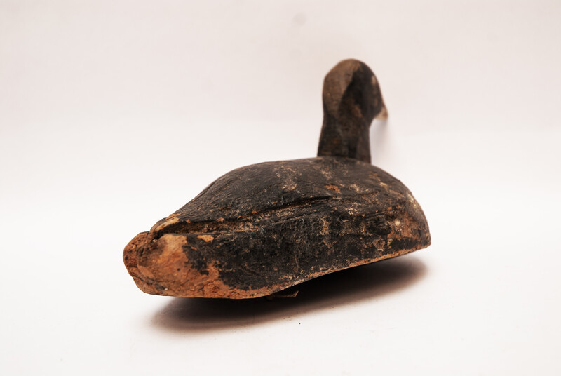 A wooden painted Dutch decoy bird in the form of a coot.